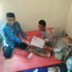 Gerak Cepat Kadis Dukcapil Serahkan Dokumen Kependudukan ke Penyandang Disabilitas di Marobo