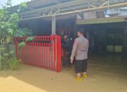 Debit Air Masih Tinggi, Polsek Bontang Barat Sigap Bantu Warga Terdampak Banjir
